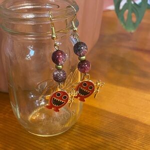 Hand Crafted Red Bead Earrings with Gold and Red Monster Charms